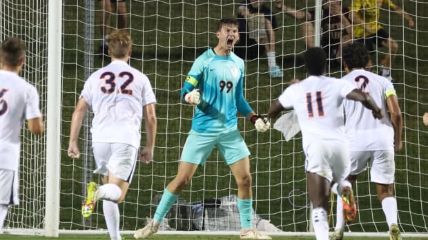 Holden Brown reacts after saving a penalty kick during the second half of the Virginia men's soccer match against Maryland at Klockner Stadium.